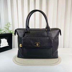 CHANEL Black Satchel with Gold Details